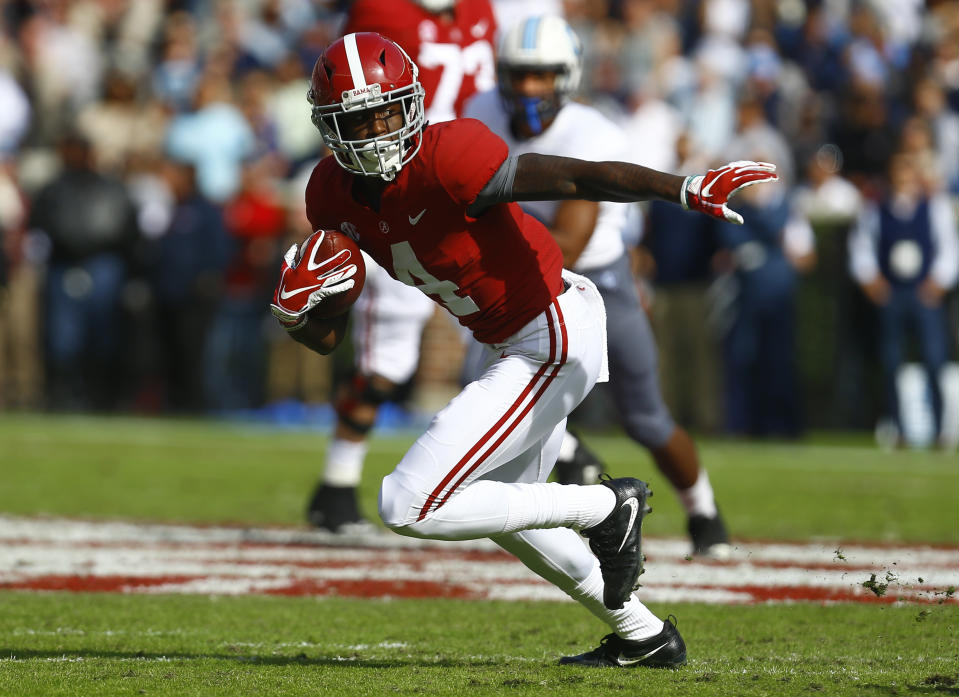 FILE - In this Nov. 17, 2018, file photo, Alabama wide receiver Jerry Jeudy (4) catches a pass against Citadel during the first half of a game in Tuscaloosa, Ala. Jeudy was named to the 2018 AP All-America NCAA college football team, Monday, Dec. 10, 2018.(AP Photo/Butch Dill, File)