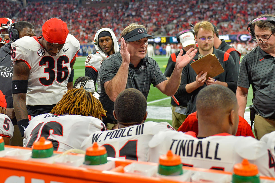 Georgia coach Kirby Smart talks to his players during the SEC championship between Alabama and Georgia on Saturday. (Rich von Biberstein/Icon Sportswire via Getty Images)