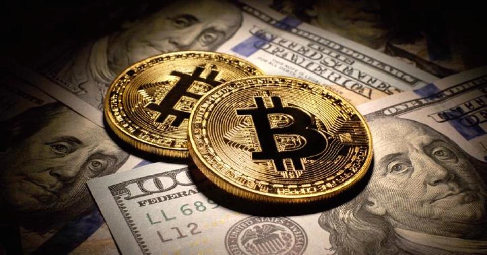 Volatile trading in bitcoin has seen it climb as high as $20,000 and a low as $9,200 within weeks (Roman Bodnarchuk/Getty Images)