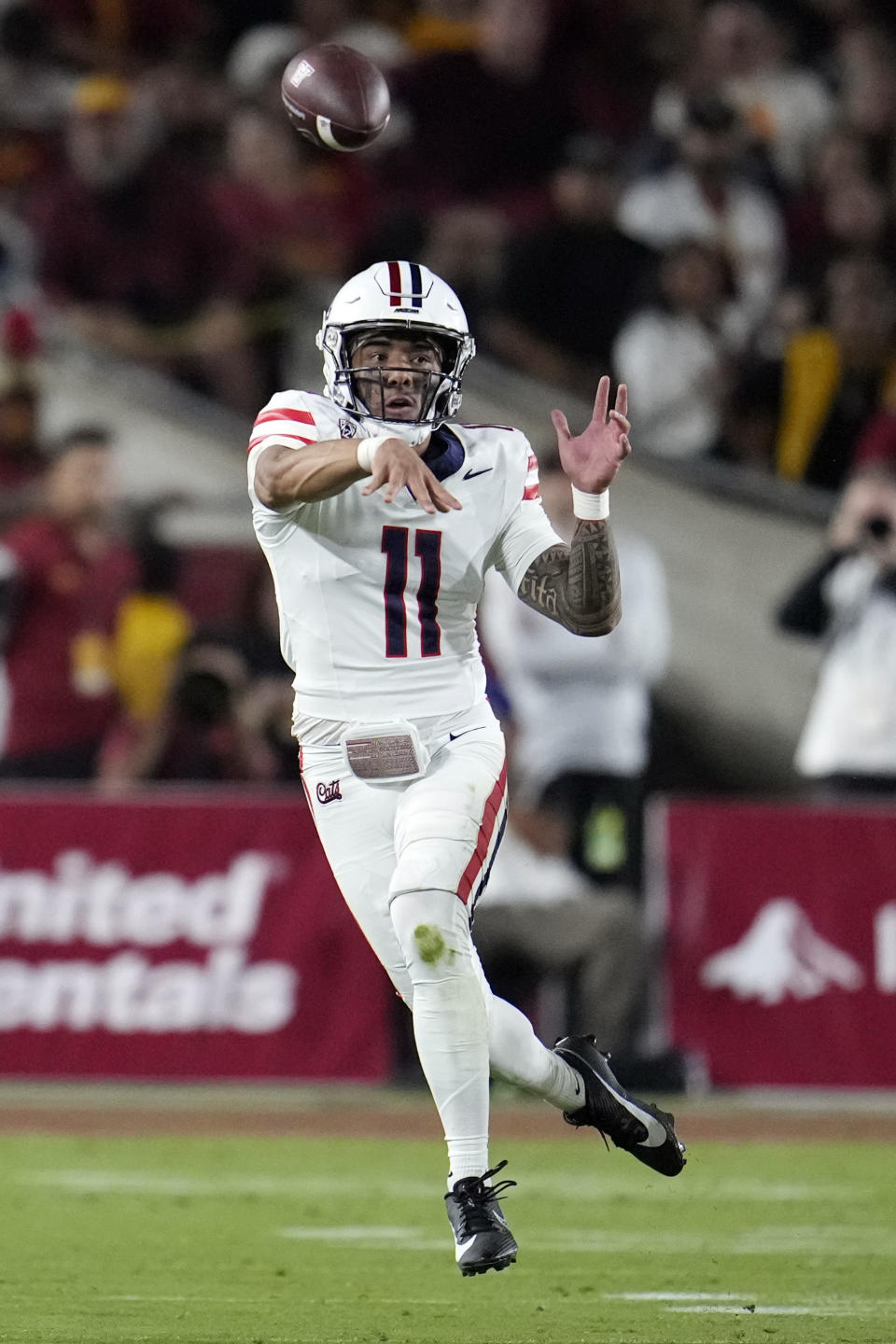 Arizona quarterback Noah Fifita throws a pass against Southern California during the first half of an NCAA college football game Saturday, Oct. 7, 2023, in Los Angeles. (AP Photo/Marcio Jose Sanchez)