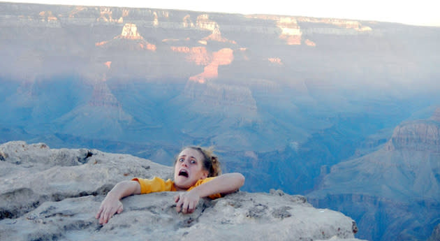 #5 Grand Canyon Prank<br> A photo of a woman pretending to slip of a cliff at the Grand Canyon was originally meant to just to teach her over-anxious mother a lesson. It spread like wildfire across the internet.