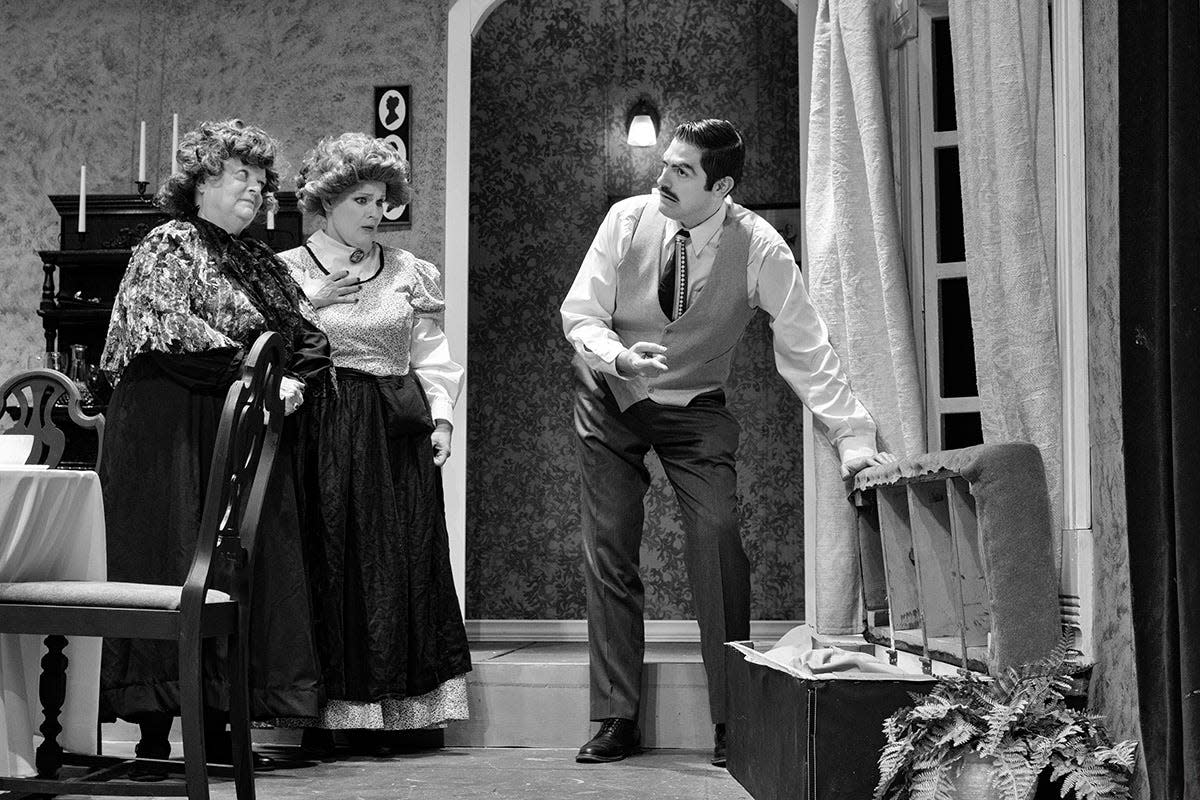 Stacey Nickel, left, Angela Runyan and Brock Butler appear in a scene from Elkhart Civic Theatre's production of "Arsenic and Old Lace" that had been scheduled to open  May 13 at the Bristol Opera House. It has been moved to May 20.
