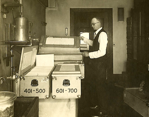 <span class="caption">US health data pioneer Ernest Codman at work on his national registry of patient outcomes, 1925.</span> <span class="attribution"><span class="source">Roy Mabrey/Boston Medical Library</span></span>