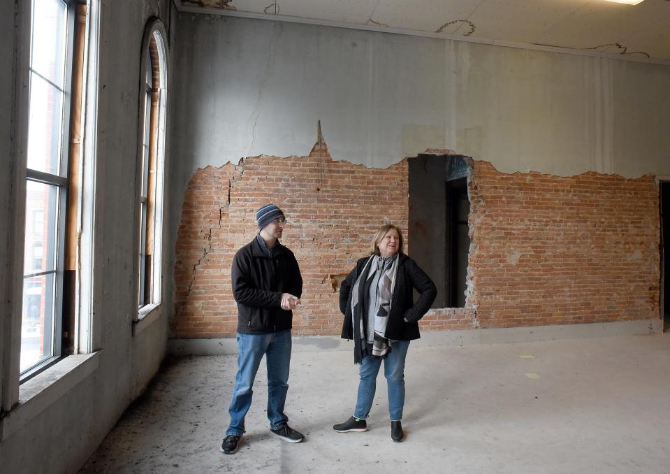 Andrew Felder, the RRCA's director of community outreach and fund development, and Gail Choate-Pettit, River Raisin Ballet Co. director, talk about renovations to the third floor of the former Monroe Bank & Trust Mortgage Center, which the RRCA recently purchased.