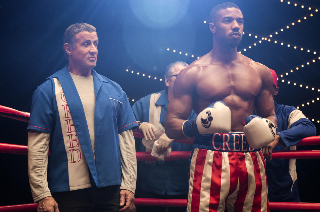 Rocky Balboa (Sylvester Stallone) stands by Adonis Creed (Michael B. Jordan) as he prepares to fight Drago Jr. in <em>Creed II</em>. (Photo: Barry Wetcher/Metro Goldwyn Mayer Pictures/Warner Bros. Pictures)