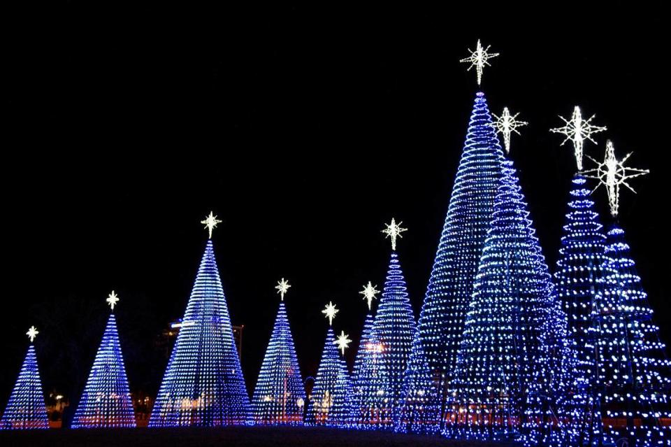 The “Dancing Christmas Trees” during the Harbor Lights Winter Festival at Jones Park in Gulfport on Thursday, Dec. 2, 2021.