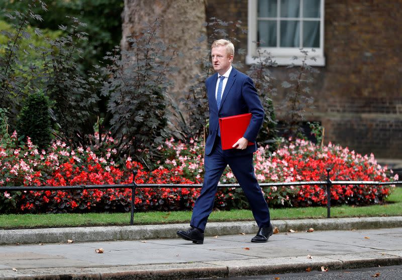 Britain's Digital, Culture, Media and Sport Secretary Oliver Dowden walks outside Downing Street in London