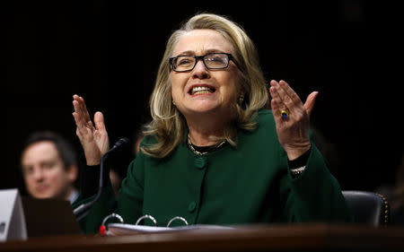 Secretary of State Hillary Clinton responds forcefully to intense questioning on the September attacks on U.S. diplomatic sites in Benghazi, Libya, during a Senate Foreign Relations Committee hearing on Capitol Hill in Washington January 23, 2013. REUTERS/Jason Reed