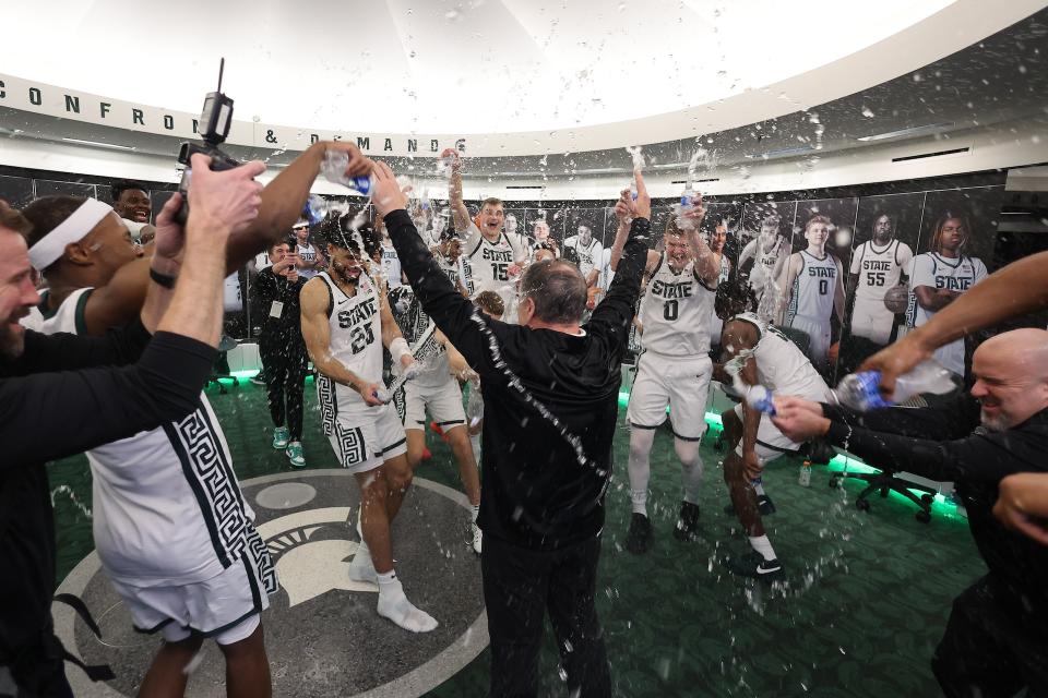 Izzo celebrates with his team after an 81-62 win over Michigan. (Rey Del Rio/Getty Images)