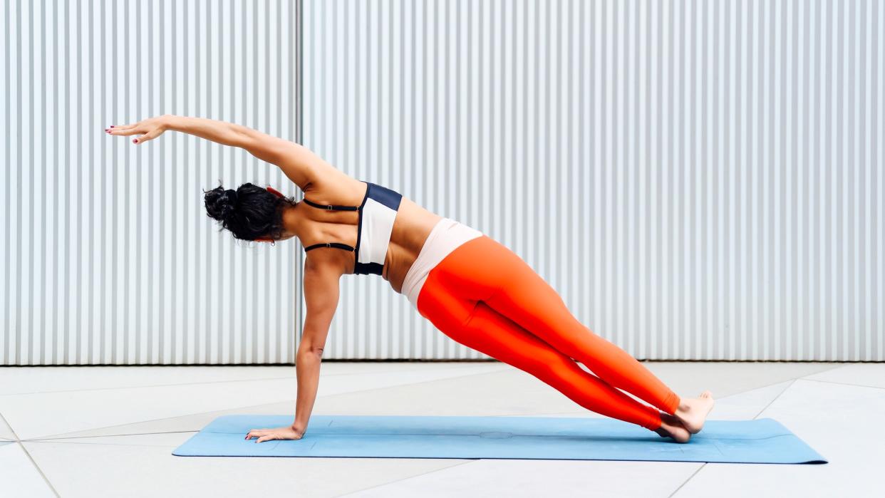  Woman doing a side plank 