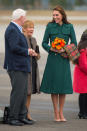 <p>The Duchess flew to a much colder part of Canada in a dark green trench coat from high street label, Hobbs, paired with her favourite LK Bennett bag and heels. </p><p><i>[Photo: PA]</i></p>