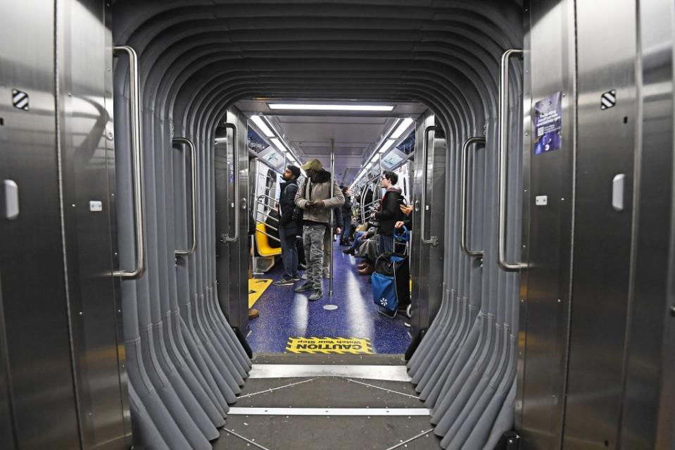 The snake-like interiors of the new R211 subway cars help facilitate easier passenger flow between cars. Matthew McDermott