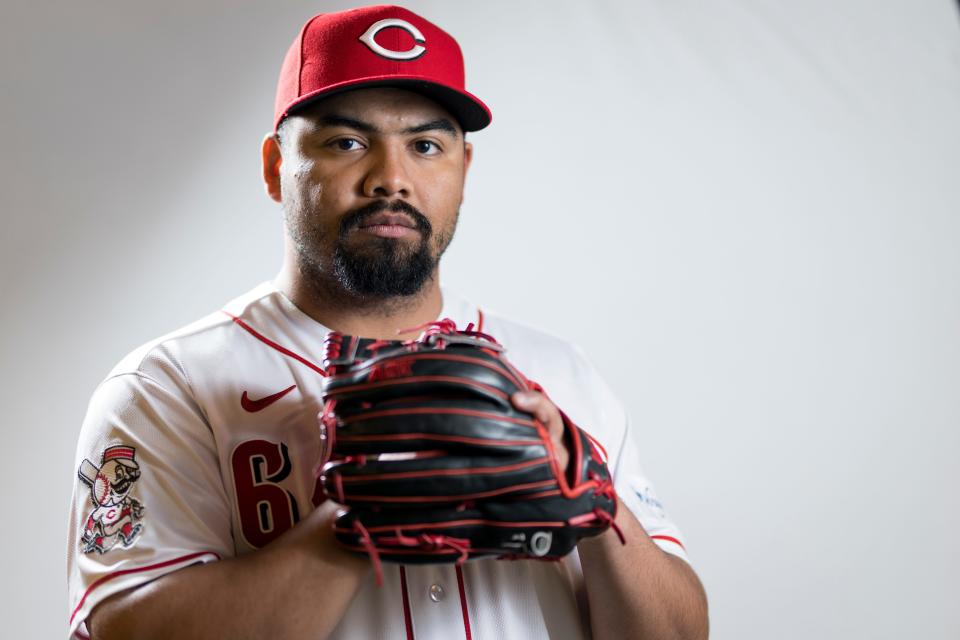 Cincinnati Reds relief pitcher Tony Santillan (64) poses for the annual picture day photo at the Cincinnati Reds Player Development Complex in Goodyear, Ariz., on Tuesday, Feb. 21, 2023.