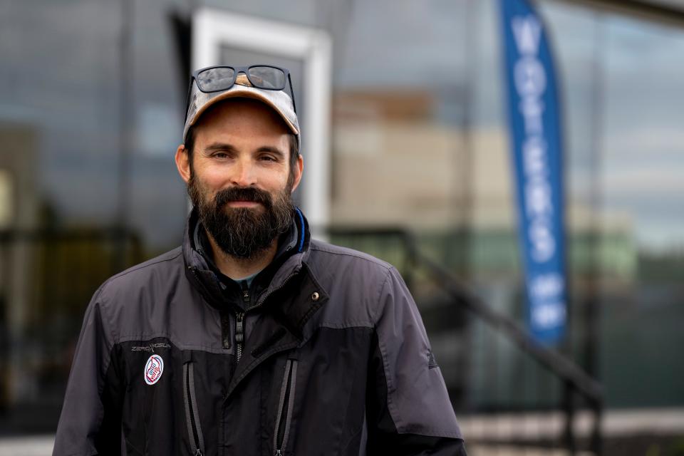 Kyle Vath, 39, a resident of Bridgetown, stands outside the Hamilton County Board of Election after casting an early ballot in Norwood on Wednesday, Oct. 19, 2022. 