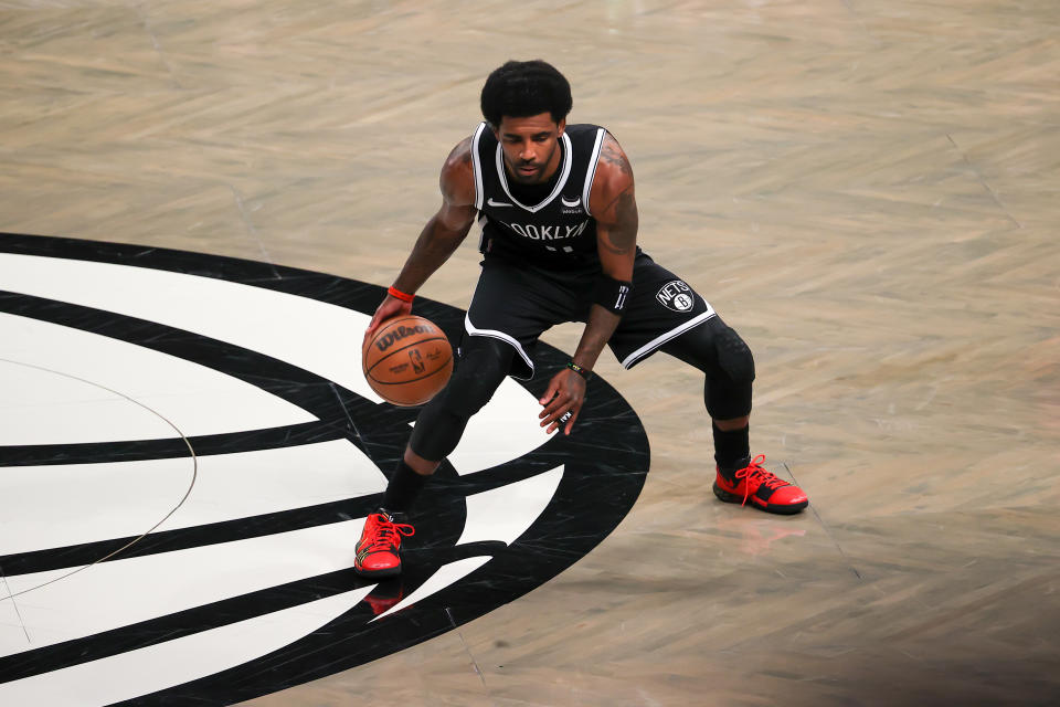 NEW YORK, NY - MARCH 27: Kyrie Irving of Brooklyn Nets is seen in action during NBA match between Brooklyn Nets and Charlotte Hornets at the Barclays Center in Brooklyn of New York City, United States on March 27, 2022. New York City Mayor Eric Adams announced Thursday the removal of the private sector mandate, clearing the way for Irving to play at Barclays Center and eventually become a full-time player. (Photo by Tayfun Coskun/Anadolu Agency via Getty Images)