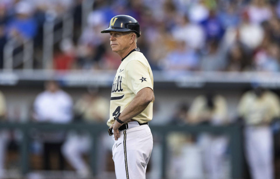 Vanderbilt head coach Tim Corbin watches from third base in the eighth inning during a baseball game against North Carolina State in the College World Series, Monday, June 21, 2021, at TD Ameritrade Park in Omaha, Neb. (AP Photo/Rebecca S. Gratz)