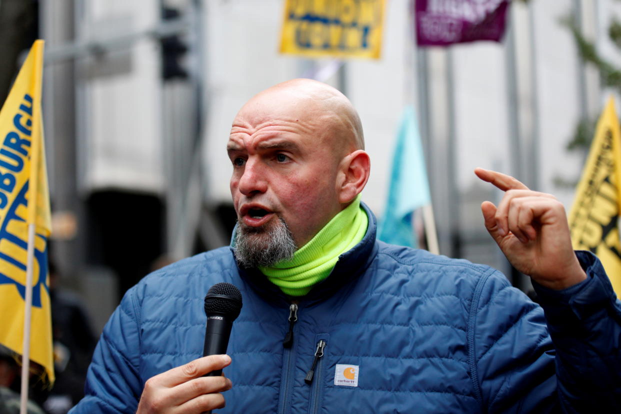 Pennsylvania Lt. Gov. John Fetterman speaks to striking health care workers from the University of Pittsburgh Medical Center outside its corporate headquarters in Pittsburgh on Nov. 18.