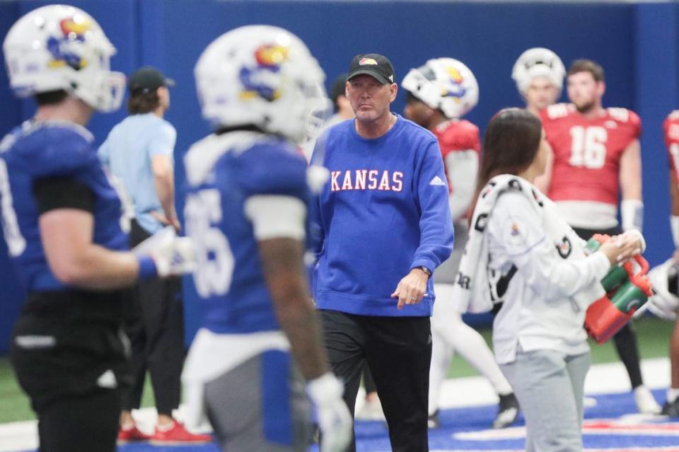 Kansas coach Lance Leipold walks through team drills during a practice on Tuesday, April 2, 2024, inside the Jayhawks’ indoor practice facility.