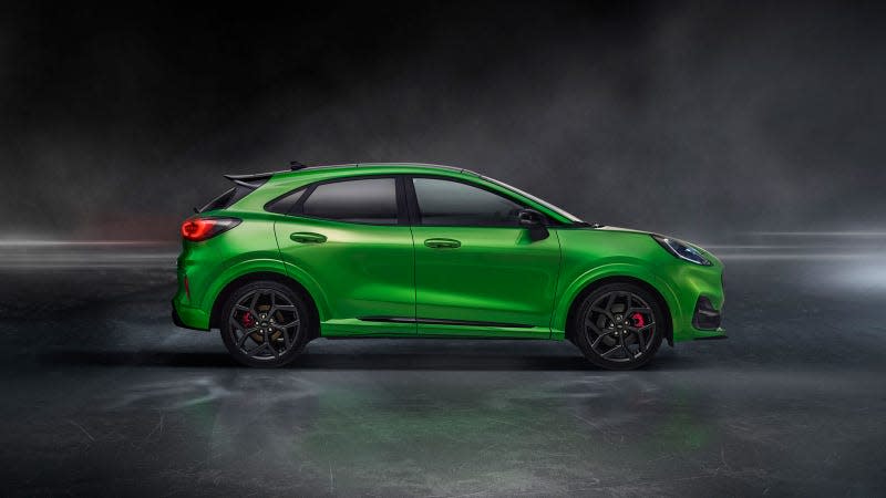 A photo of a green Ford Puma SUV. 