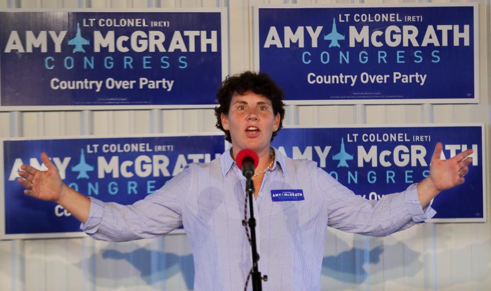 Congressional candidate Amy McGrath speaks at a potluck rally in Frankfort, Ky. 
Oct. 10, 2018