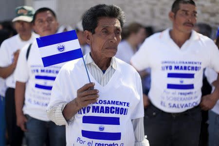 Former army members and relatives participate in a protest in San Salvador, El Salvador, February 25, 2016. REUTERS/Jose Cabezas