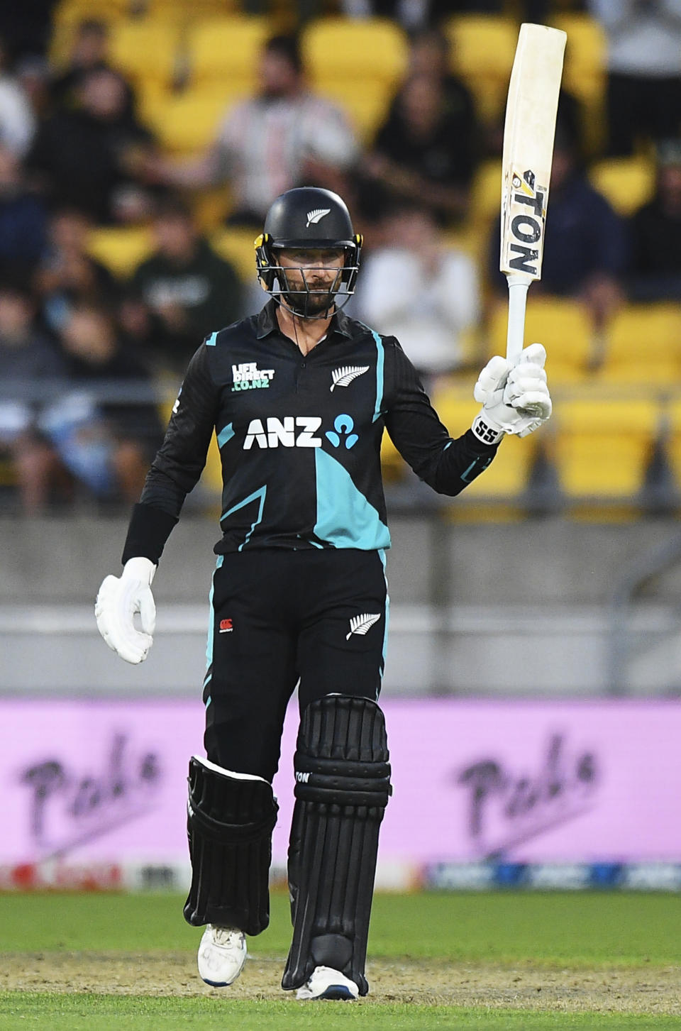 New Zealand's Devon Conway reacts after scoring 50 runs during the T20 cricket international between Australia and New Zealand in Wellington, New Zealand, Wednesday, Feb. 21, 2024. (Chris Symes/Photosport via AP)