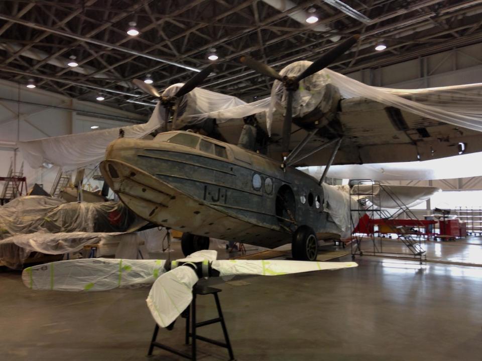 This Sikorsky JRS-1 sea plane survived the bombings of Pearl Harbor in Hawaii during World War II and began flying reconnaissance missions the day of the attack, in seen at the National Air and Space Museum’s Udvar-Hazy Center in Chantilly, Va., Thursday, Jan. 23, 2014. Faced with an ongoing shortage of space for storage and care of its massive collection, the Smithsonian’s new restoration hangar for the nation’s historic aircraft and spacecraft and spacesuit collections is a bright spot for the museum complex in northern Virginia. Last year, the Smithsonian’s inspector general testified in Congress that the continued use of substandard facilities was a risk to important art and science collections. (AP Photo/Brett Zongker)