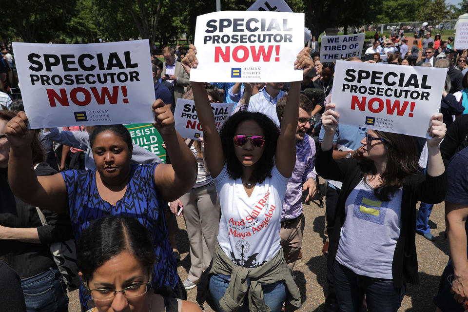 <p>About 300 people rally to protest against President Donald Trump’s firing of Federal Bureau of Investigation Director James Comey outside the White House May 10, 2017 in Washington, DC. Angry over the firing of Comey, the demonstrators demanded that an independent special prosecutor investigate possible ties between the Trump campaign and Russian officials. (Chip Somodevilla/Getty Images) </p>