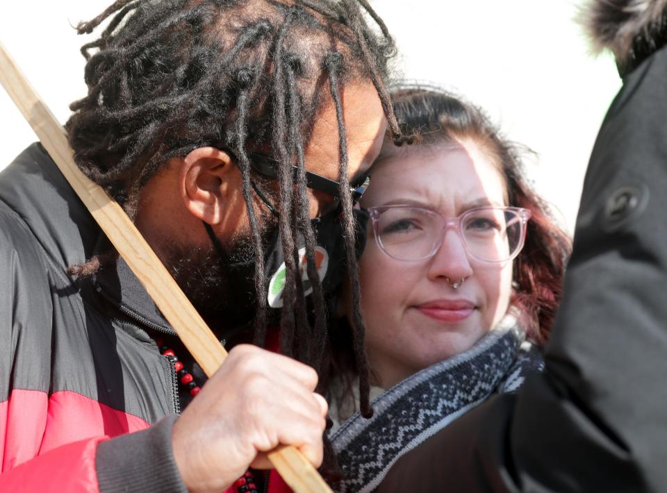 Hannah Gittings, the girlfriend of Anthony Huber who was shot and killed by Kyle Rittenhouse, talks with Justin Blake, uncle of Jacob Blake, outside the Kenosha County Courthouse on Thursday. Kyle Rittenhouse is charged with homicide and attempted homicide in the Aug. 25, 2020, fatal shootings of two people and the wounding of a third during unrest in Kenosha that followed the police shooting of Jacob Blake. His attorneys say he acted in self-defense.