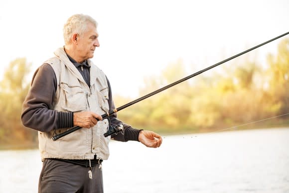 Older man fishing.