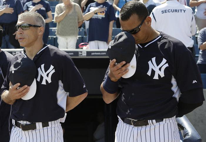 Joe Girardi and Alex Rodriguez during less complicated times in spring training. (AP)