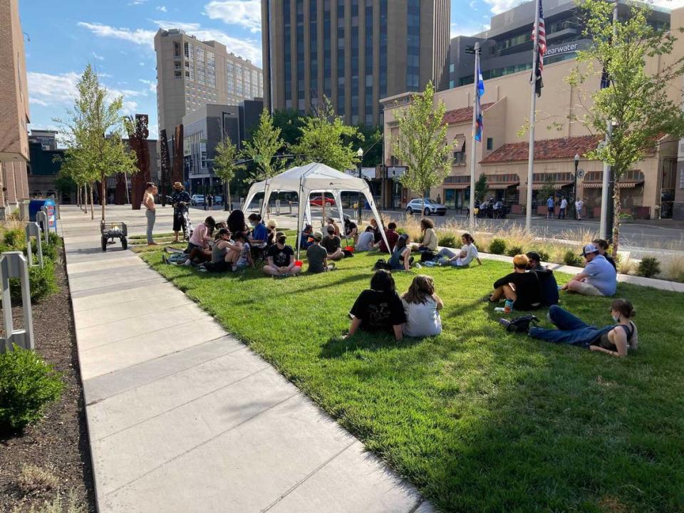 Activists, many with Boise Black Lives Matter, gathered outside City Hall on Tuesday evening after the original protest was canceled.