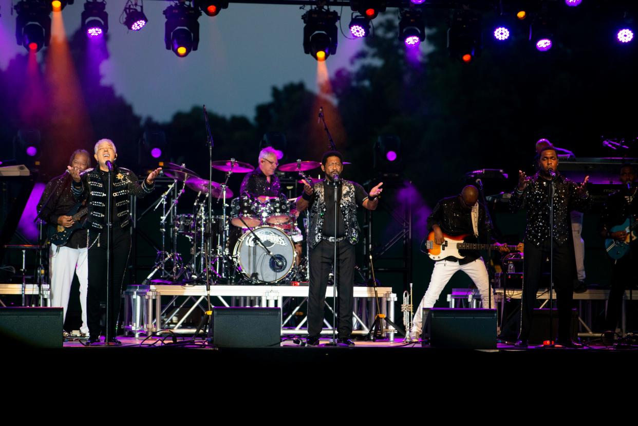 The Commodores perform during the Community Concert at The Ballpark at Jackson that brings to a close the Jackson-Madison County Bicentennial celebrations on Saturday, August 13, 2022, in Jackson, Tenn. Founding band member William "WAK" King (center) sings to the crowd.