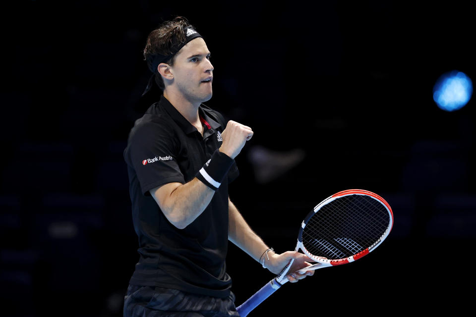 LONDON, ENGLAND - NOVEMBER 15: Dominic Thiem of Austria celebrates match point during his round robin match against Stefanos Tsitsipas of Greece during their first round robin match on Day one of the Nitto ATP World Tour Finals at The O2 Arena on November 15, 2020 in London, England. (Photo by Clive Brunskill/Getty Images)