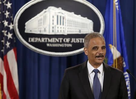 United States Attorney General Eric Holder holds a news conference announcing updates in the Justice Department's investigation in the shooting of Michael Brown in Ferguson, Missouri, in Washington September 4 2014. REUTERS/Gary Cameron