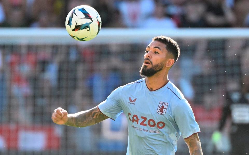 Aston Villa's midfielder Douglas Luiz looks eyes the ball during the friendly football match between Stade Rennais and Aston Villa, at the Roazhon Park stadium in Rennes, western France on July 30, 2022 - AFP 