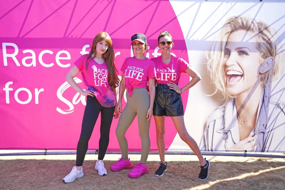 Former Girls Aloud band members (left to right) Nicola Roberts, Cheryl and Nadine Coyle take part in Race for Life for Sarah' at Hyde Park, London with Kimberley Walsh walking the 5k remotely. Picture date: Sunday July 24, 2022. (Photo by Jonathan Brady/PA Images via Getty Images)