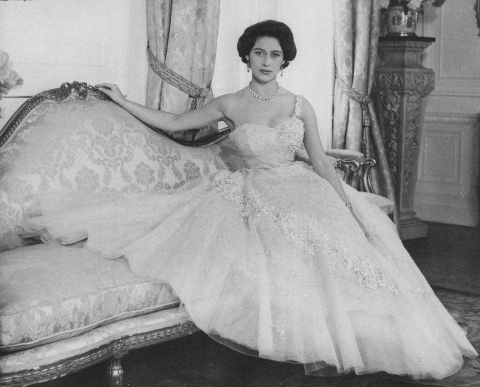 <p>Margaret posed for her 26th birthday portrait wearing a one-shouldered pink tulle gown. The dress featured elaborate flower embroidery and sequins. </p>