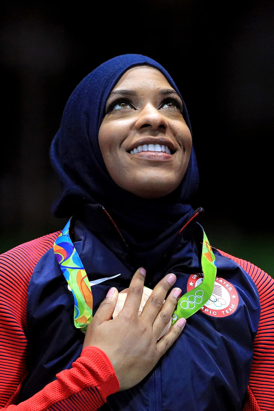 <p>Fencing star Ibtihaj Muhammad is the first Muslim American athlete to compete at an Olympic Games while <a rel="nofollow" href="http://sports.yahoo.com/news/ibtihaj-muhammad-on-trumping-hate-as-muslim-u-s-olympic-star-164000593.html" data-ylk="slk:wearing a hijab;elm:context_link;itc:0;outcm:mb_qualified_link;_E:mb_qualified_link;ct:story;" class="link  yahoo-link">wearing a hijab</a>. Muhammad earned a bronze medal in Rio for the women's team sabre event. (Photo by Tom Pennington/Getty Images) </p>
