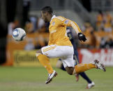 HOUSTON, TX - NOVEMBER 03: Corey Ashe #26 of the Houston Dynamo attacks the ball against the Philadelphia Union in the second leg of the playoffs on November 3, 2011 at Robertson Stadium in Houston, Texas. The Dynamo won 1 to 0 and will play the Sporting K.C. Sunday, November 6, 2011. (Photo by Thomas B. Shea/Getty Images)