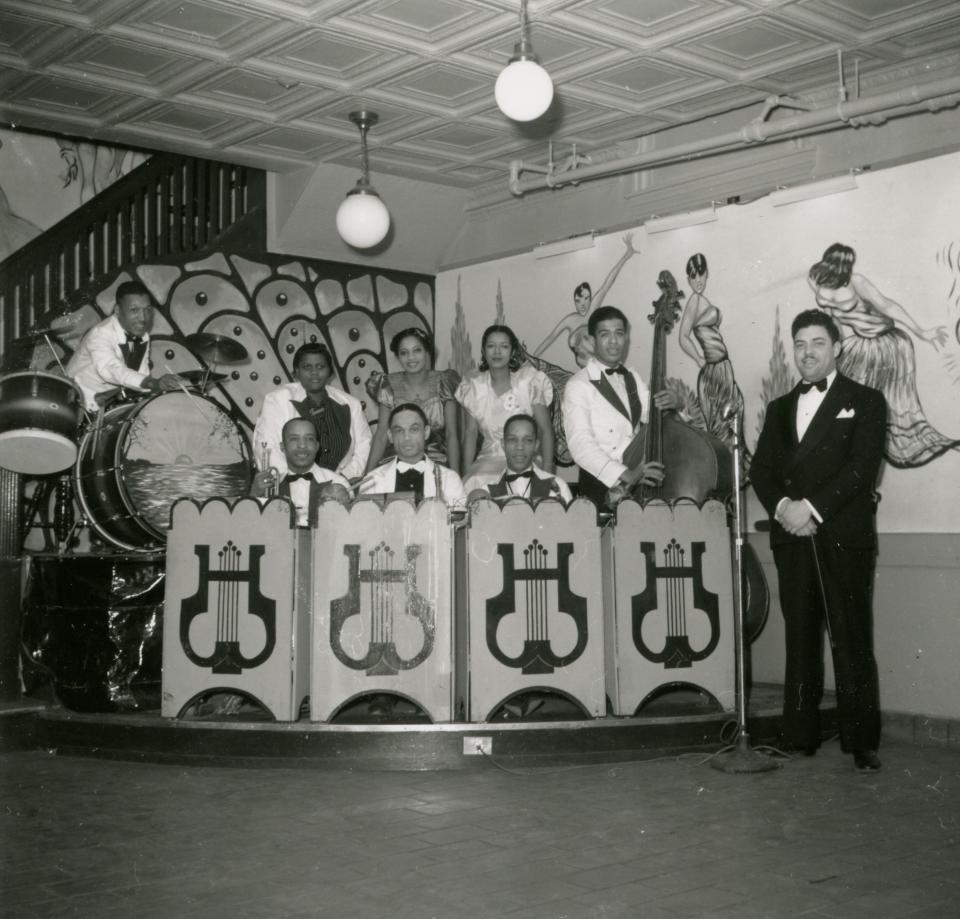 Members of a band ready to perform at the Spot Cafe in Wilmington, Delaware in 1940.