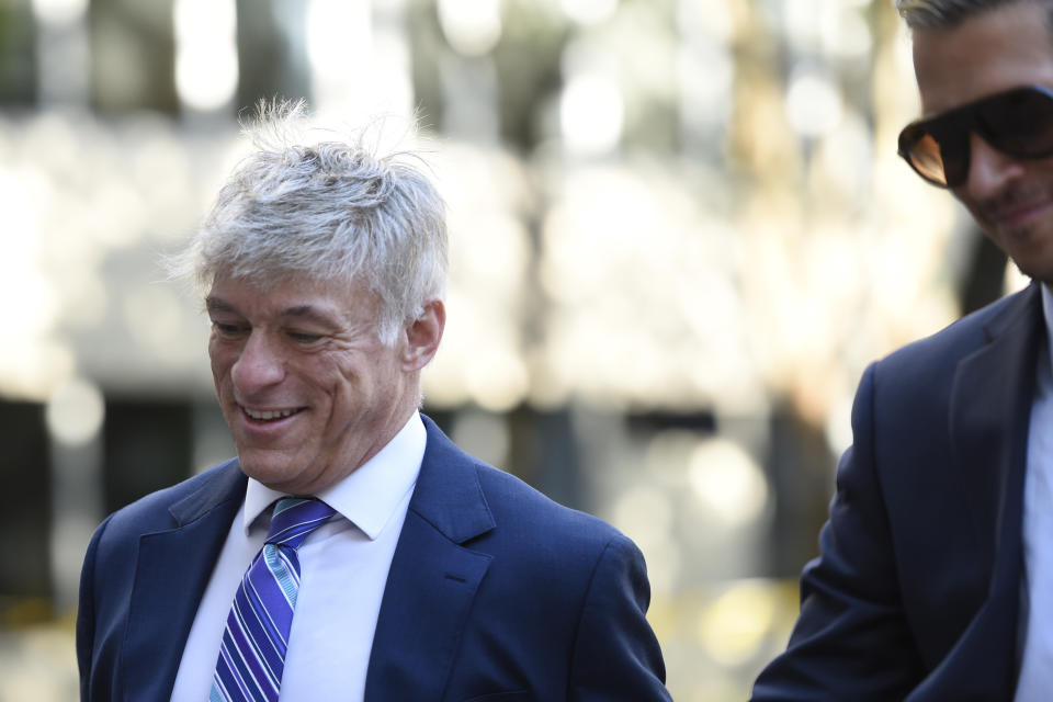 St. Michael's founder and CEO Michael Voris walks into the federal courthouse Thursday, Sept. 30, 2021, in Baltimore. U.S. District Judge Ellen Hollander scheduled a hearing Thursday for the lawsuit that rally planners St. Michael’s Media filed against the city. St. Michael's claims city officials cancelled the Nov. 16 rally because they disapprove of the group's religious message. (AP Photo/Gail Burton)