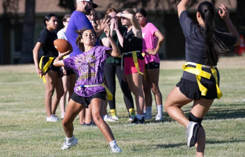 Escalon’s Sammy Lang makes a pass during flag football practice at Escalon High School in Escalon, Calif., Thursday, August 3, 2023.