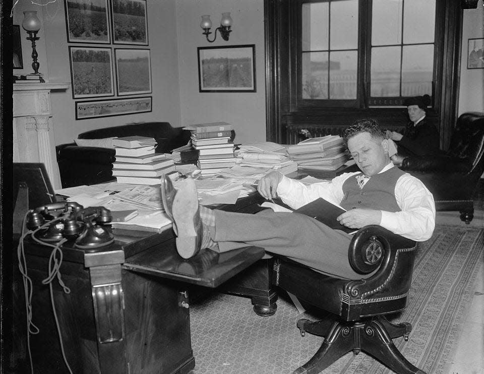 U.S. Sen. Allen Ellender of Terrebone Parish takes a break as other Southern senators continue his 1938 filibuster against a bill that would have outlawed lynching across the country. The bill failed.