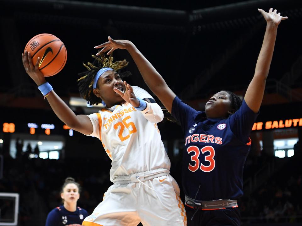 Tennessee's Jordan Horston (25) gets a shot off while guarded by Auburn's Kharyssa Richardson (33) during the NCAA college basketball game between the Tennessee Lady Vols and Auburn Tigers in Knoxville, Tenn. on Sunday, February 19, 2023. 