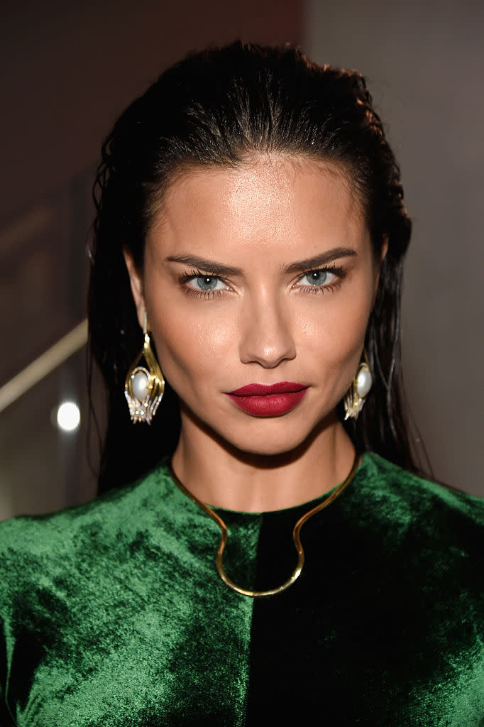 Adriana Lima found a genius way to show off a thigh-high slit without risking wardrobe malfunction