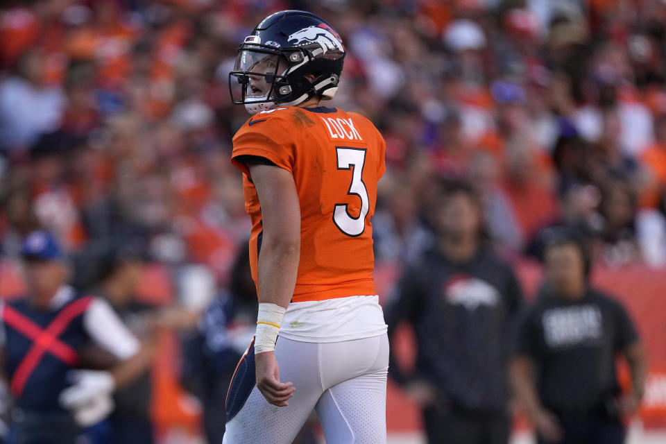 Denver Broncos quarterback Drew Lock (3) walks to the bench during the second half of an NFL football game against the Baltimore Ravens, Sunday, Oct. 3, 2021, in Denver. (AP Photo/David Zalubowski)