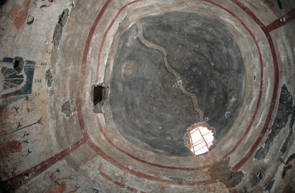 The dome ceiling of the 1,500-year-old tomb, which was discovered in Shuozhou City, China, is painted dark gray to "signify the infinite space of the sky." A silver river, with waves, weaves across the sky representing the Milky Way galaxy. Sta