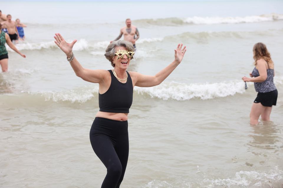 On Monday, January 1, 2024 plungers rang in the the New Year with a splash at the annual Polar Bear Plunge at Bradford Beach in Milwaukee, Wisconsin.