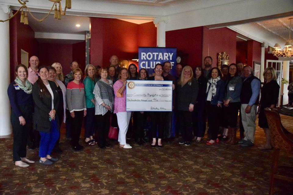 Recipients of the Rotary Club of Petoskey's 2022 grants pose in the lobby of the Perry Hotel after the weekly club meeting on Wednesday, May 18.